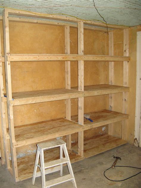 Since basements can be damp, metal shelving and cabinetry protect possessions better than wooden alternatives; basement shelves | Flickr - Photo Sharing!