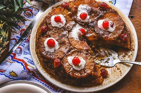 As the cake bakes, the pineapple releases some of it's juices and sweetness which runs out into the brown sugar topping. from scratch Pineapple Upside Down Cake | NellieBellie
