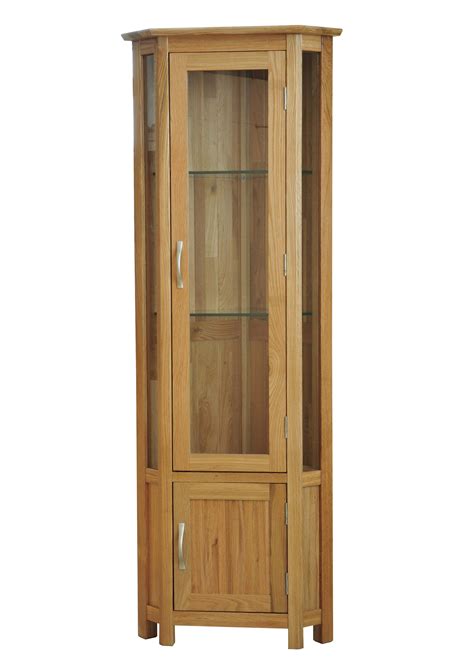 The glass keeps everything inside on display but reduces the dust, so things look pristine for longer. Corner Display Cabinet - Choice Furniture and Carpets