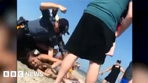 Police Officer Filmed Punching Woman On New Jersey Beach Bbc News