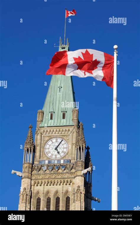 Parliament Of Canada Peace Tower And Canadian Flag Stock Photo Alamy