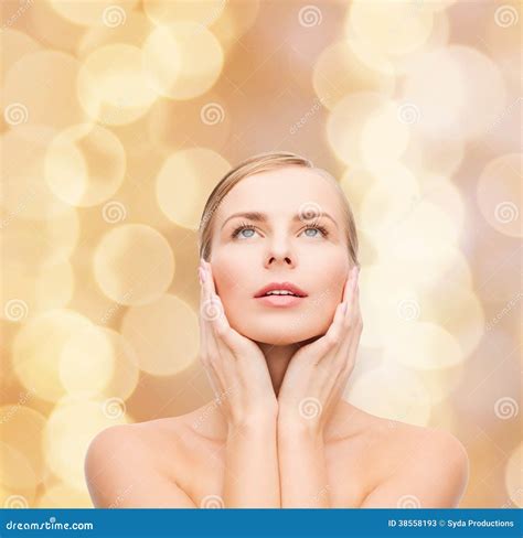 Beautiful Woman Touching Her Face And Looking Up Stock Image Image Of Happy Girl 38558193