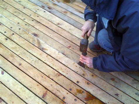 Want to spruce up your front porch with a simple diy project this spring? Caulking a wooden deck