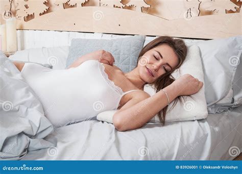 Rest Sleeping Comfort And People Concept Young Woman Stretching In Bed At Home Bedroom