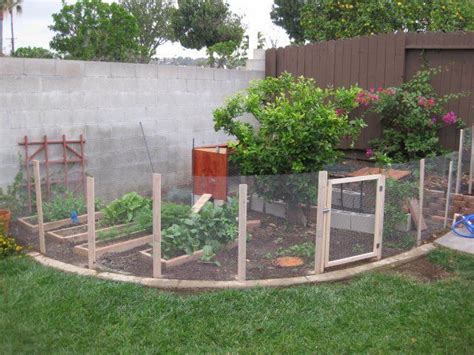 Any outdoor gathering would be so much more fun if classic string lights are in the mix, whether you choose to hang them on a fence or under a pergola. Garden Fencing Ideas To Keep Dogs Out Photograph | Fenced Ga