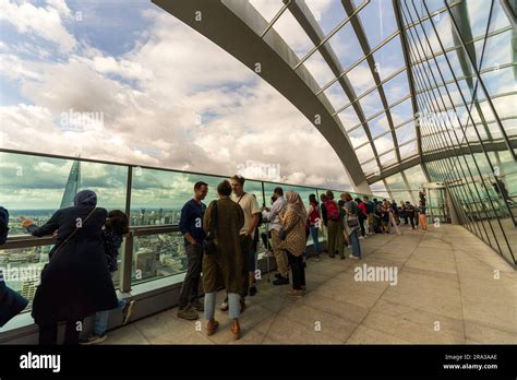People enjoy the London skyline views from the Sky Garden terrace, the
