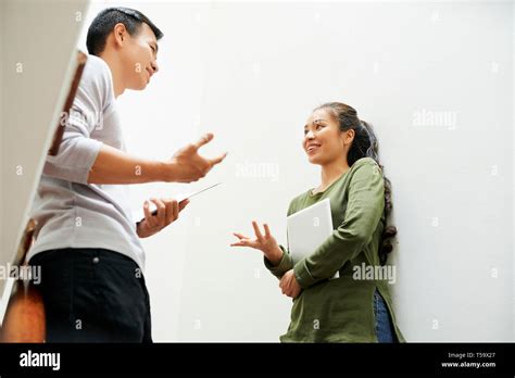 Young People Exchanging Ideas Stock Photo Alamy