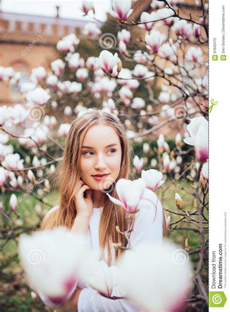 Young Girl Relax In Beautiful Garden Fantastic Pink Magnolias Tree