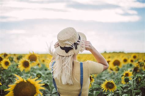 Woman With Sunflower By Stocksy Contributor Jovana Vukotic Stocksy