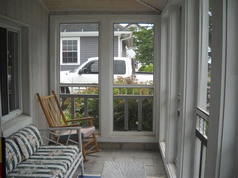 This is a view standing at one of those doors looking across the room. Front Porch Ideas | House with porch, Small front porches ...