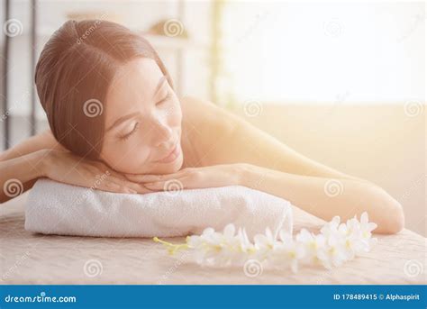 Woman Relaxing With A Massage In A Spa Center Stock Image Image Of Relax Leaf 178489415
