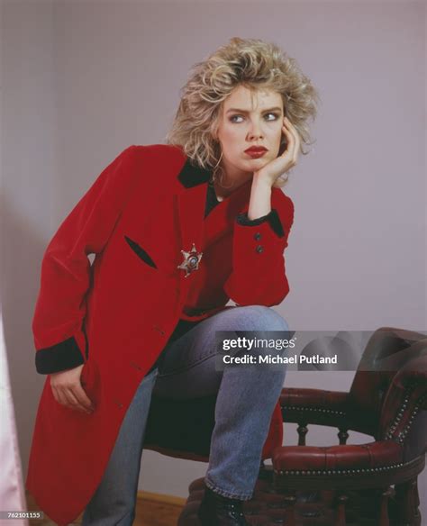 Studio Portrait Of English Pop Singer Kim Wilde Posed Wearing A Red