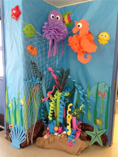 I ended up combining several techniques on 2 coral reefs and they became the spotlight of our craft room. Under the sea decorations ideas, pool noodle coral reef ...