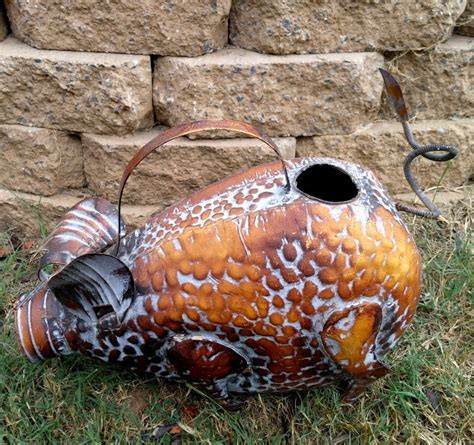 Please note that we are currently all out of the ordinary. Creative Metal Yard Art - The Gardening Cook