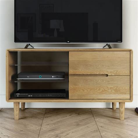 Choosing the right piece of furniture is important if you're following a certain theme or creating a desired aesthetic with your overall décor. Scandic Solid Oak Furniture Small TV Unit - Best Price