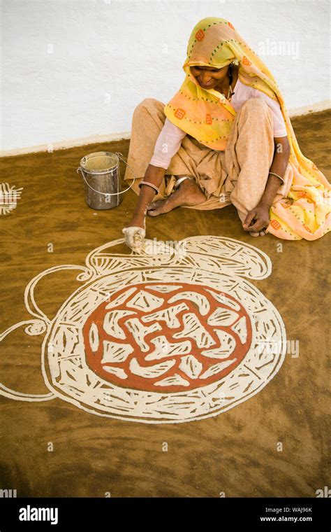 India Rajasthan Nawalgarh Woman Painting Diwali Rangoli Design On
