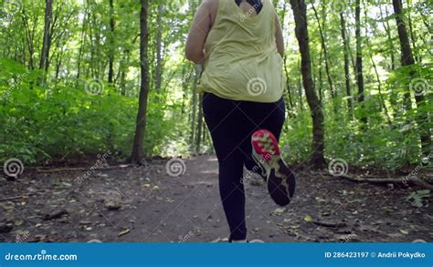 Curvy Girl Embracing Nature S Trail for Fitness and Wellbeing Stock