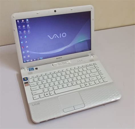 Sony Vaio White Colour Laptop Wallpaper With Information