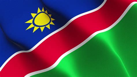 The namibia flag was officially recognized on march 21, 1990.the flag of namibia is diagonally separated from lower raise corner to upper fly corner by narrow white bands with a broad red streak in. Namibia - Detail Of Waving Flag Stock Footage Video 782608 ...