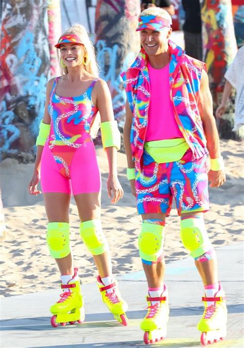 margot robbie and ryan gosling rollerblade in neon at venice beach while filming barbie movie