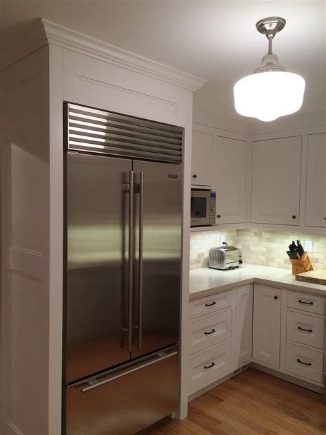 A shopping basket brimming with food? Heritage Carpentry Company » Built-in fridge surround