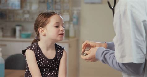 Doctor Examining Young Child With Stethoscope Stock Footage Sbv
