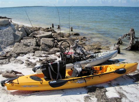 Two Hobie Kayaks Geared Up And Ready For A Day Of Fishing With Multiple