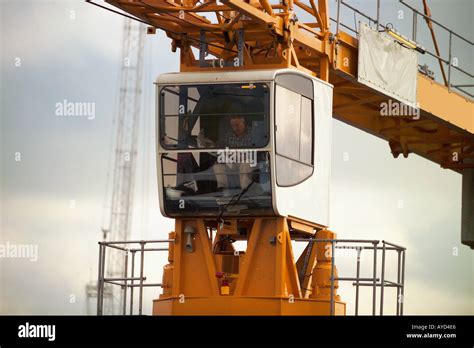 Crane operator in crane cabin Stock Photo - Alamy
