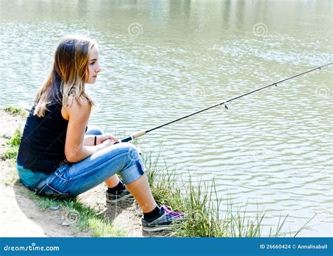 Young Teen Fishing On A River Bank Stock Photo Image Of River Water