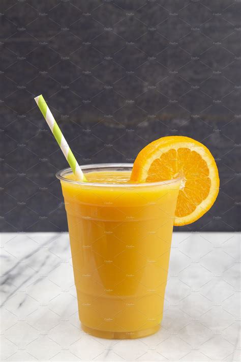 Freshly Squeezed Orange Juice Stock Photo Containing Orange And Juice