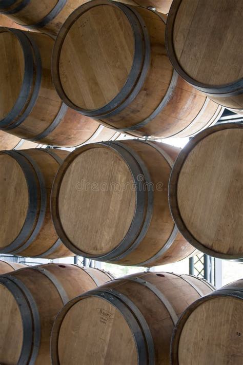 Wooden Barrels Stand On Top Of Each Other Wine Storage Part Of The