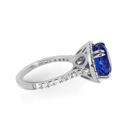 Round Sapphire And Diamond Halo Engagement Ring Haywards Of Hong Kong
