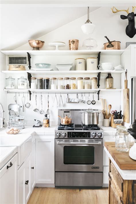 Suitable for the open design of the platform, the iron chair blends harmoniously into the overall picture. 24 Best White Kitchens - Pictures of White Kitchen Design ...