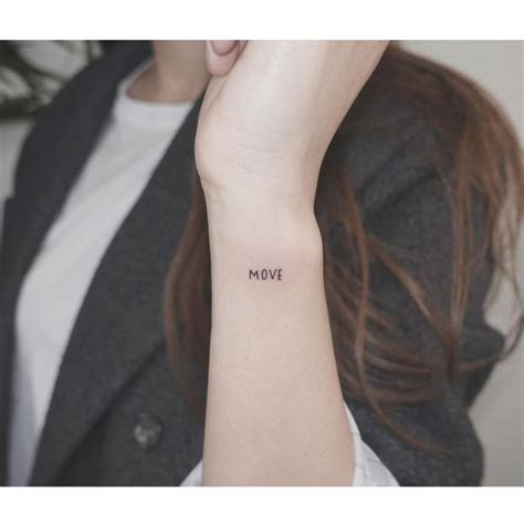 Move Lettering Tattoo On The Wrist