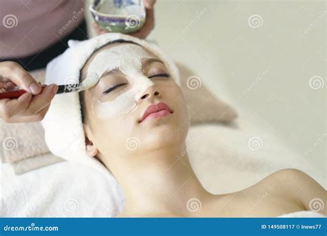 Beautiful Caucasian Woman Having Mask Lying On Spa Facial Treatment