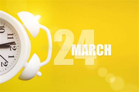 March 24th Day 24 Of Month Calendar Date White Alarm Clock On Yellow