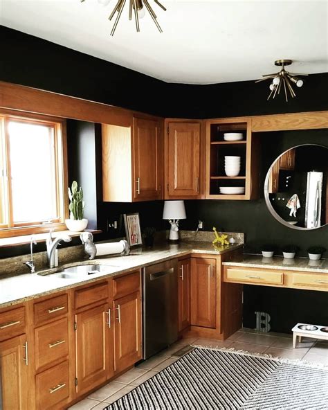 Get tips and tricks to update dated oak kitchen cabinets without painting them or spending a lot of time and money! Update honey oak cabinets... no paint #honeyoakcabinets ...