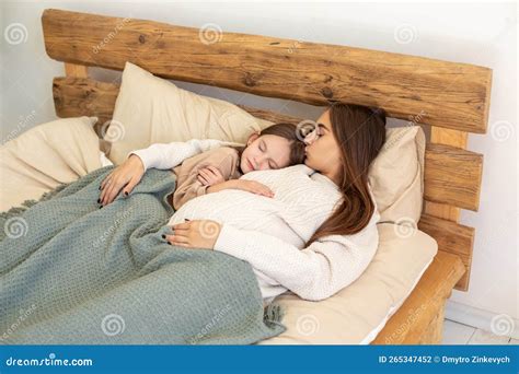 Mom And Daughter Sleeping Peacefully Together Stock Photo Image Of Togetherness Longhaired