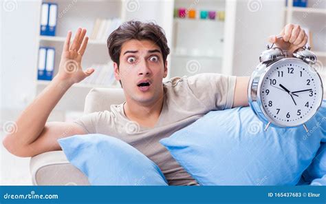 The Man Having Trouble Waking Up With Alarm Clock Stock Image Image