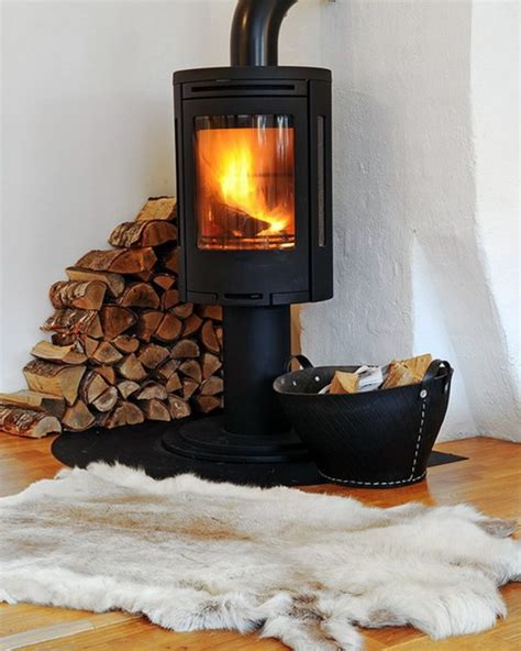 Wood pellet stoves are stoves that burn compressed wood for heating residential spaces. 35 Ideas for scandinavian fireplaces | Interior Design ...