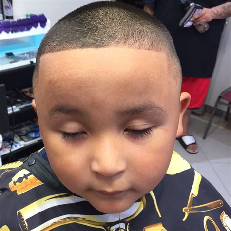 The gentleman in the picture has a perfectly parted hairstyle complete with brush rows and lots of hair care product for a glossy finish. Pin on Haircut Style‼️I AM A Barber‼️#barber #hair #fade # ...