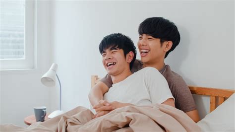 Free Photo Handsome Asian Gay Couple Talking On Bed At Home Young Asian Lgbtq Guy Happy