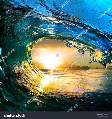 Rough Colored Ocean Wave Falling Down Stock Photo