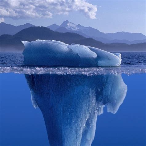 View Of An Iceberg Above And Below The Surface Of The Water Below The Surface Water Walls