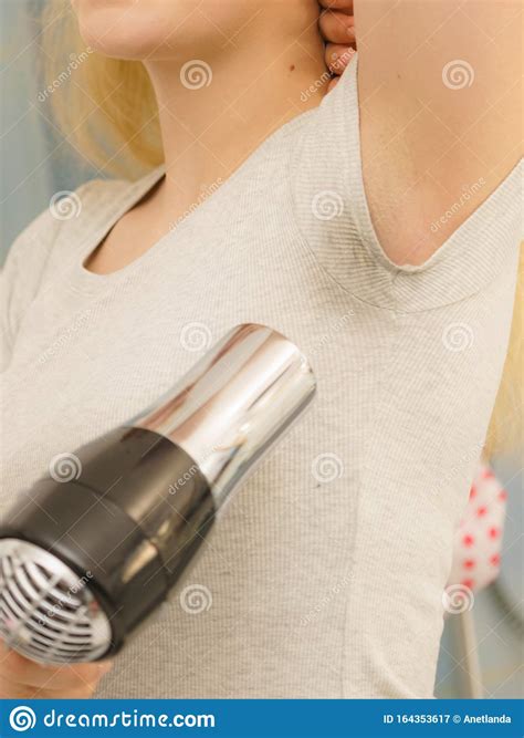 Woman Drying Sweat Stains Using Hair Dryer Stock Image Image Of Dryer