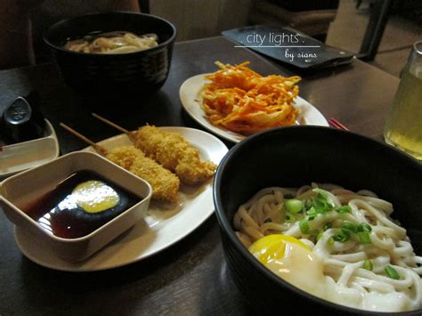 Curry udon, topped with three wonderfully runny eggs. sanuki udon at taman desa | city lights