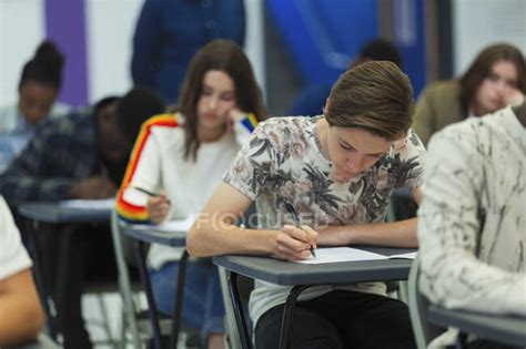 Focused High School Students Taking Exam — Serious Indoors Stock