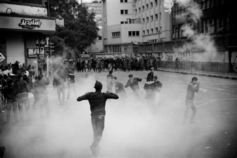 Police troops fire tear gas on Tahrir protesters قوات الأم Flickr