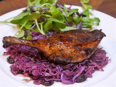 Roasted Duck Legs In Red Wine And Cassis Sauce With Braised Red Cabbage