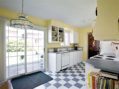 Both sides of the kitchen are kept busy while the middle is left open for efficient movement. Galley Kitchen Remodel Ideas | HGTV